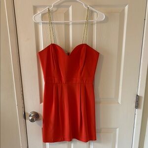 Vibrant Orange Mini Dress with Gold Straps